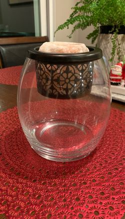 Glass candle holder with a salt candle inside