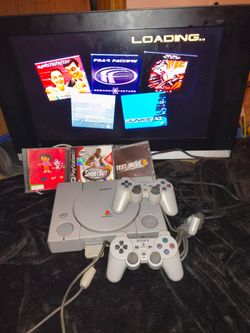 Sony PlayStation 1 Console with Controllers and Games