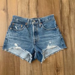 Levis blue premium distressed raw hem jean shorts