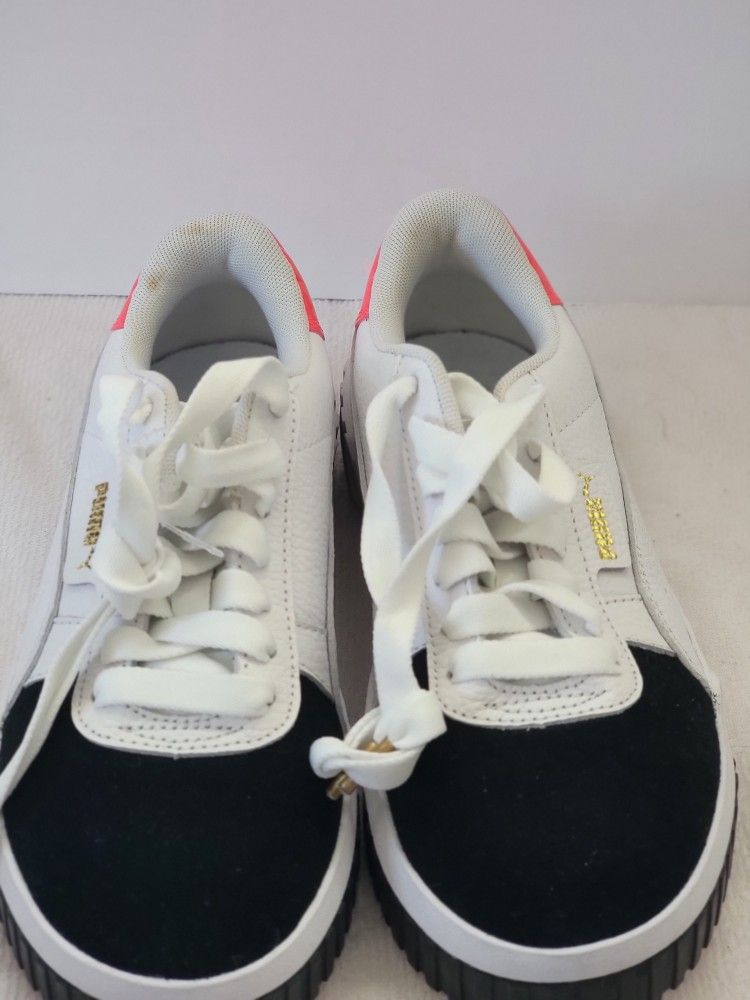 women's Puma Cali Remix sneakers in a black, white, and hot pink colorway