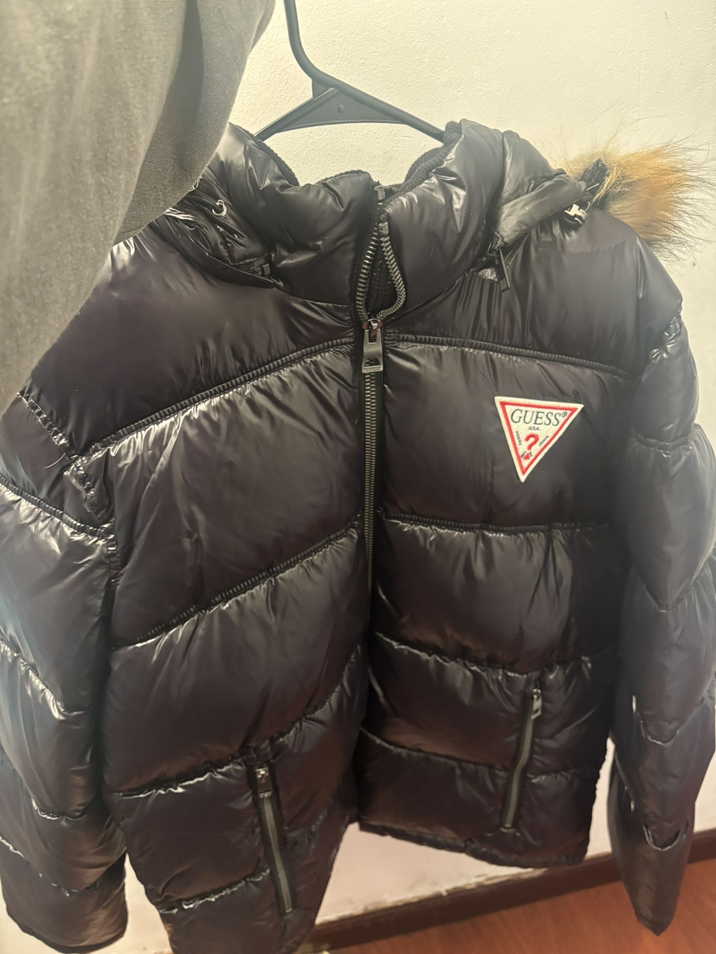 GUESS shiny black puffer jacket with a faux fur-trimmed hood
