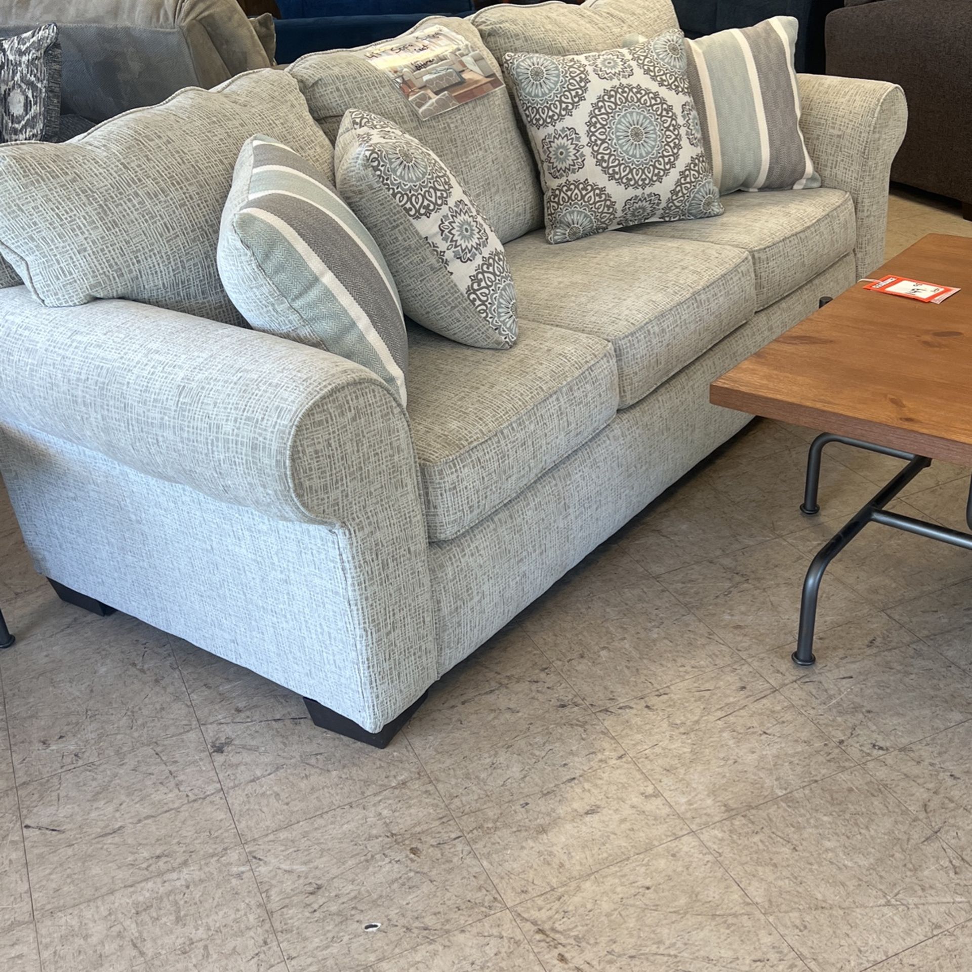 Brand new so far loveseat an accent chair, and ottoman all four pieces for only 1849