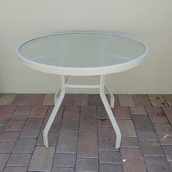 Preowned aluminum glass patio table