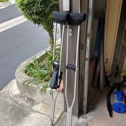 Crutches with pads and drink holder