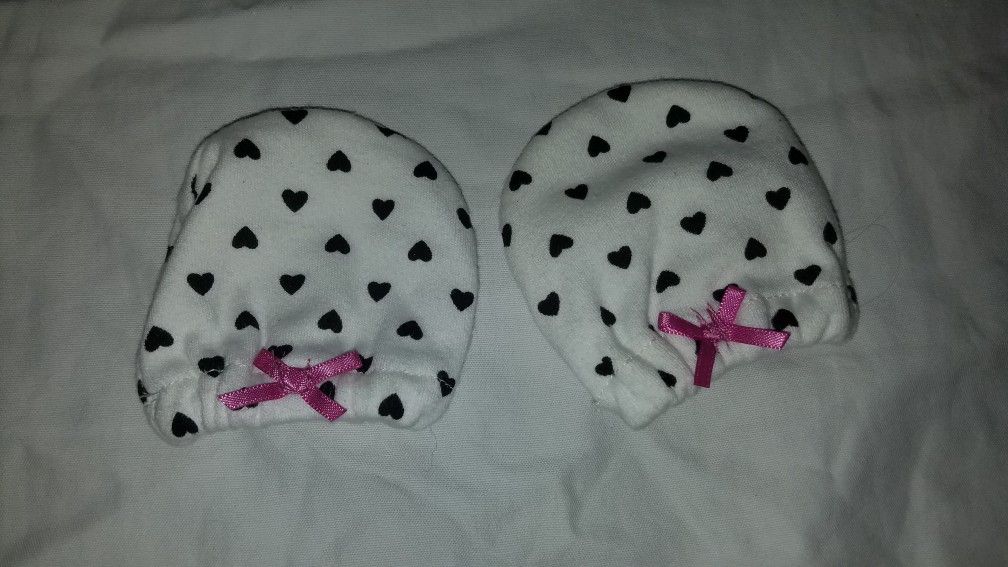 Brand new washed new born baby mitts