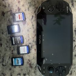 SONY PSVITA W CHARGER, 5 Games & Case 