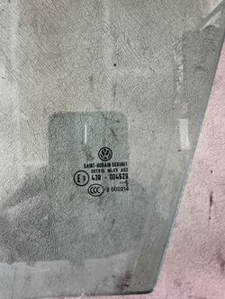 VW original driver side glass.