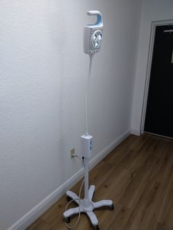 Medical Exam light with casters. Very clean, works perfectly.
