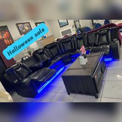 Black power reclining sectional sofa with led lighting