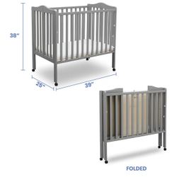 NEW! Delta foldable gray mini crib & mattress 🌿