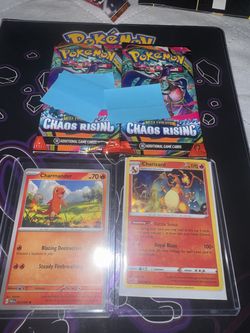 Cracked ice charizard plus 2 boosters and Charmander.