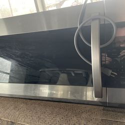 New/unboxed Samsung Above Range Microwave 
