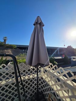 9 ft umbrella and base (extra weights included)