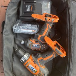 Ridgid Impact Drill  and Driver + Charger  + new 2Ah battery