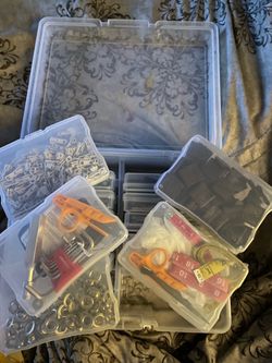 Clear sewing suitcase with supplies