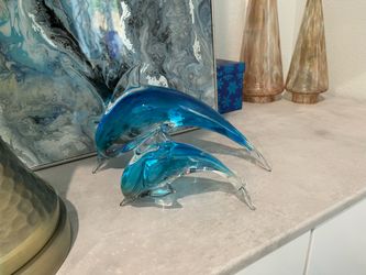 Glass dolphins