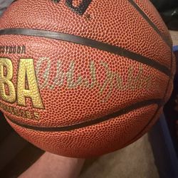 Leather basketball signed by Jerry West, Kareem Abdul-Jabbar, and James Worthy from NBA All-Star event