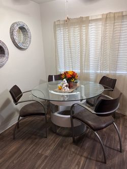Glass dinning table & chairs