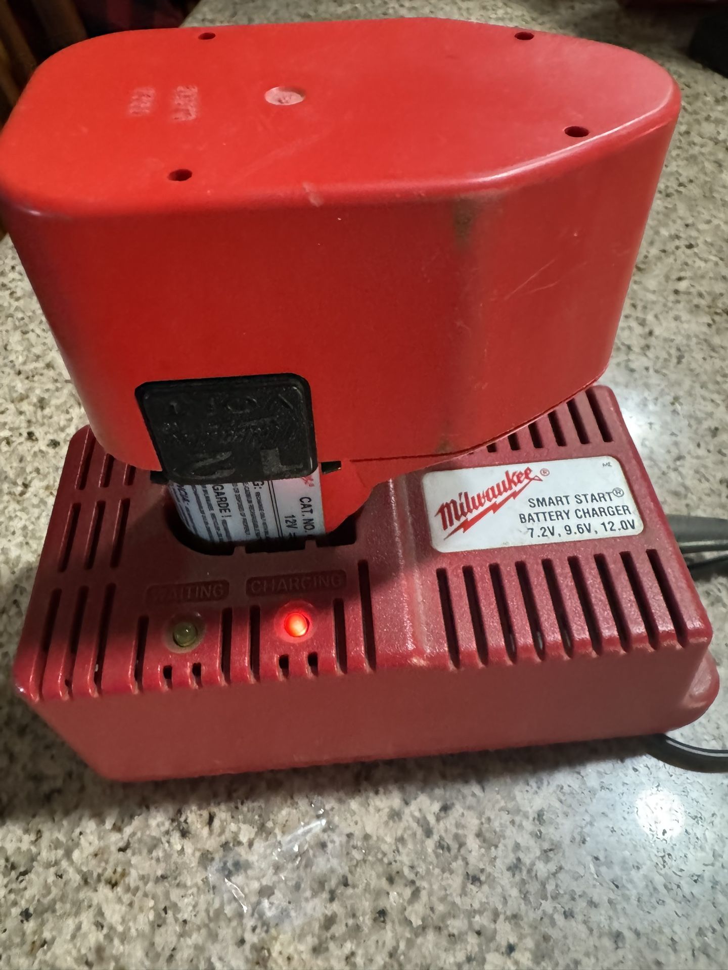 Milwaukee Battery Charger + Battery