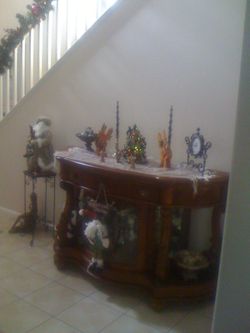 Dark wood curio/ sideboard