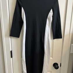 Woman’s black and white Zara midi dress. Size small.