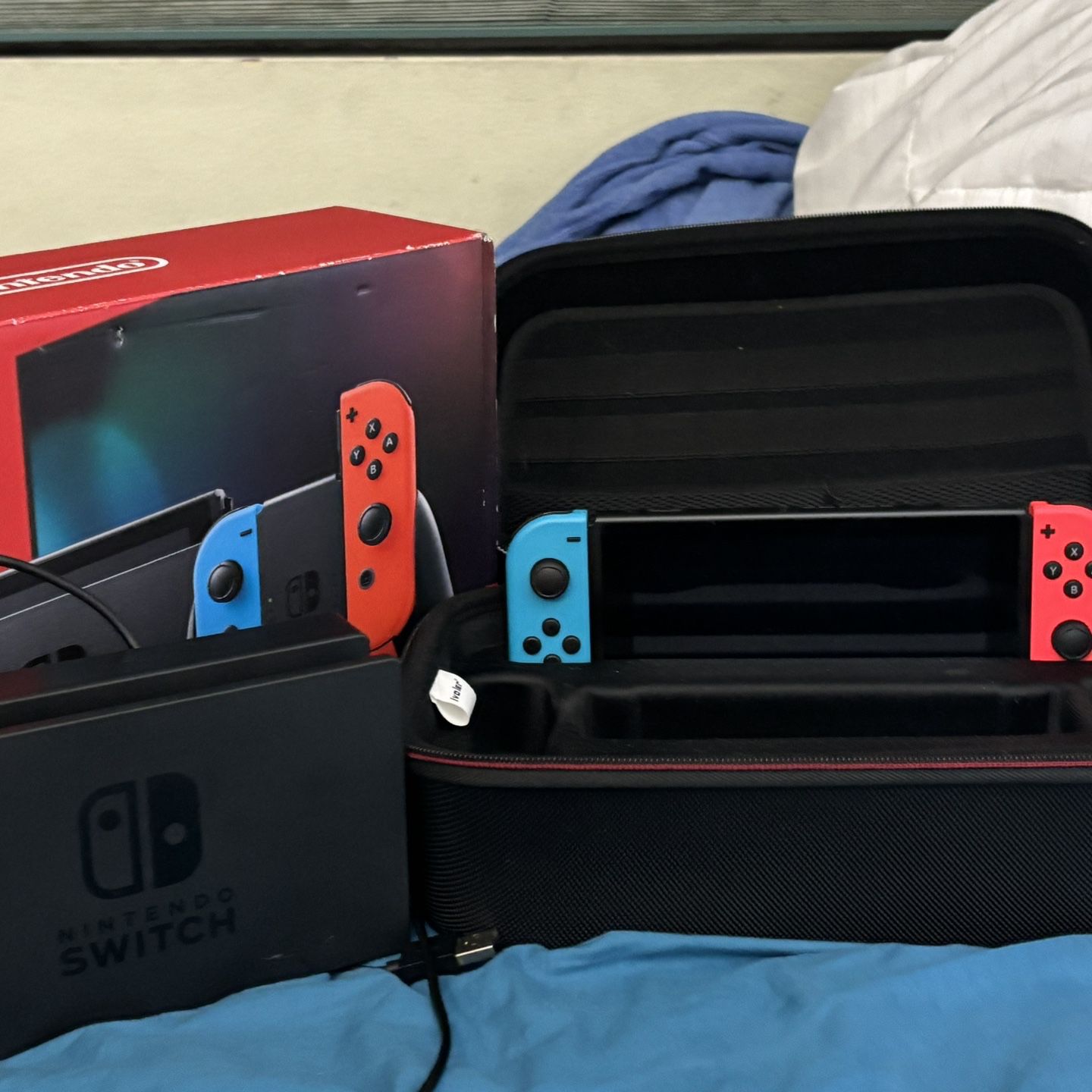 Nintendo Switch And Case.  Used.  Works Fine. 