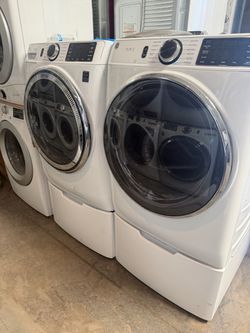GE  front load  washer and dryer with pedestal