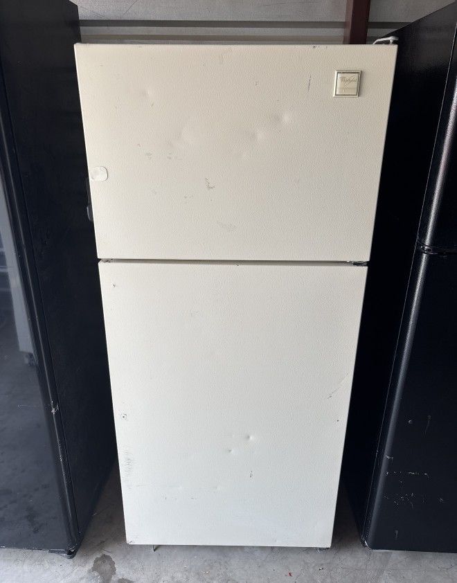 White Whirlpool Refrigerator And Freezer