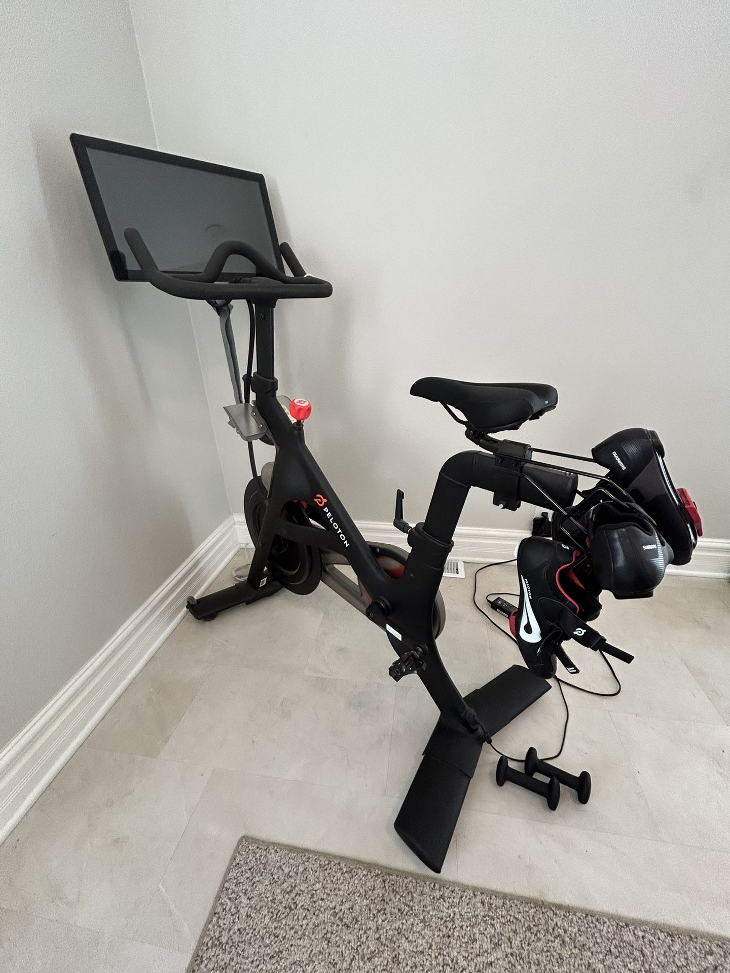 Peloton Bike + 2 Pairs Of Shoes 