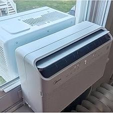 Air Conditioner - U Shaped Window Unit with Remote and Outer Support Brackets - 8,000 BTU's - Blows Ice Cold Air 19" W X 22" D X 13" T Excellent Condi