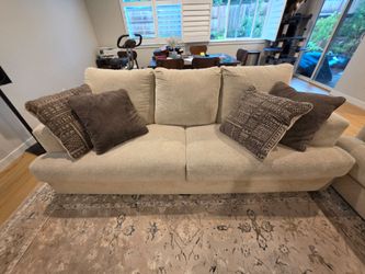 2 Couches plus 8 decorative pillows