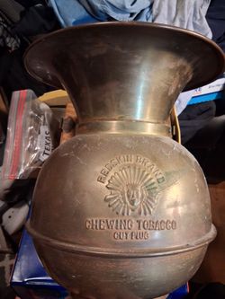 Vintage Redskin brand chewing tobacco spittoon
