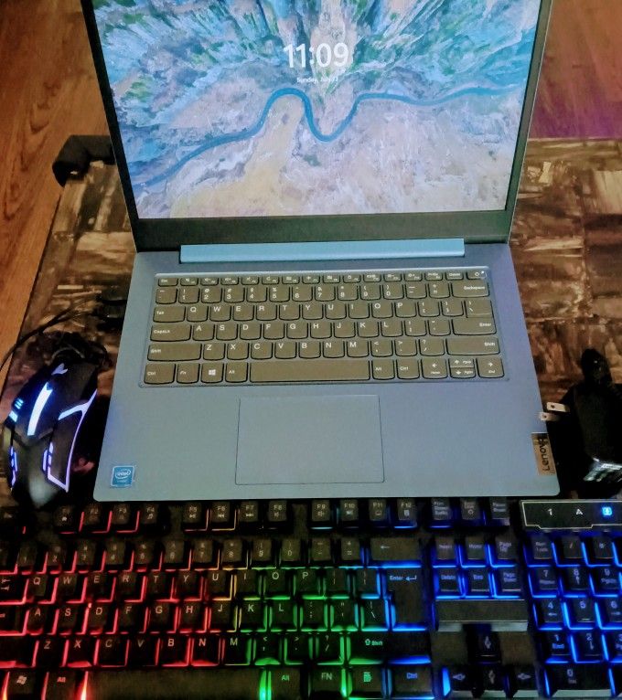 Lenovo IdeaPad 1 Laptop With RGB Keyboard, Mouse, And Charger