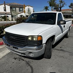 Used 2005 gmc 8 ft bed,very strong running work truck. 216,634miles always serviced. New tires.belts, hoses, battery and new catalytic converters, als