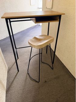 Tall desk and bar stool