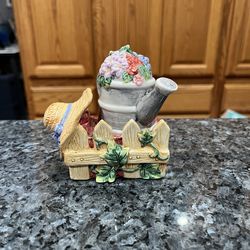 Ceramic Garden Watering Can and Straw Hat pair of Salt & Pepper Shakers.  Size approximately 4 inches tall.  Brand new never used.  Has been on displa