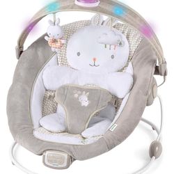 InLighten by Ingenuity Twinkle Tails Vibrating Infant Baby Bouncer with Lightning Toy Bar and Pillow