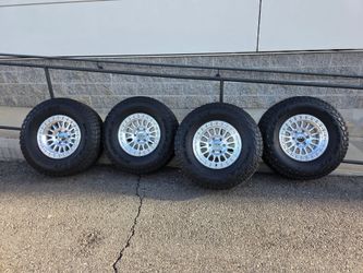 17" KMC w/ 35" Falken Wildpeak AT3  tires