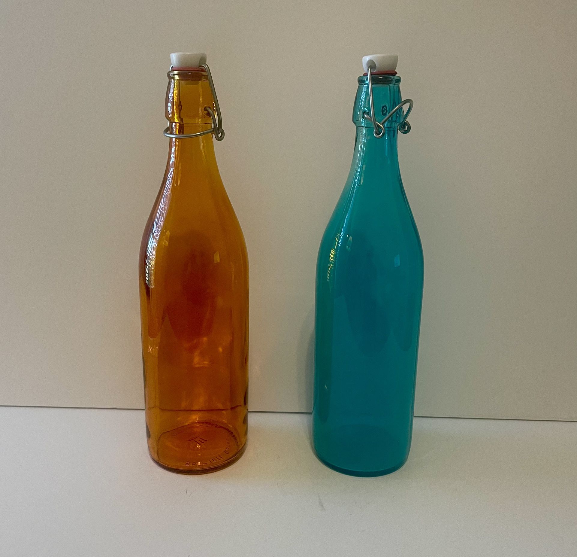 Pair Of Italian Bormioli Rocco Color Glass Swing Top Bottles