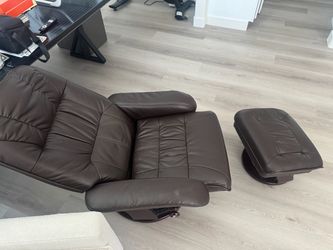 Brown leather reclining chair