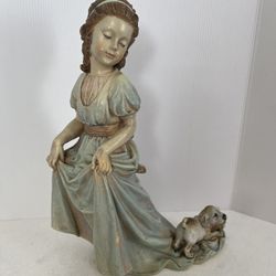 Elena and Scooter" porcelain Statue 12” Inch Tall
