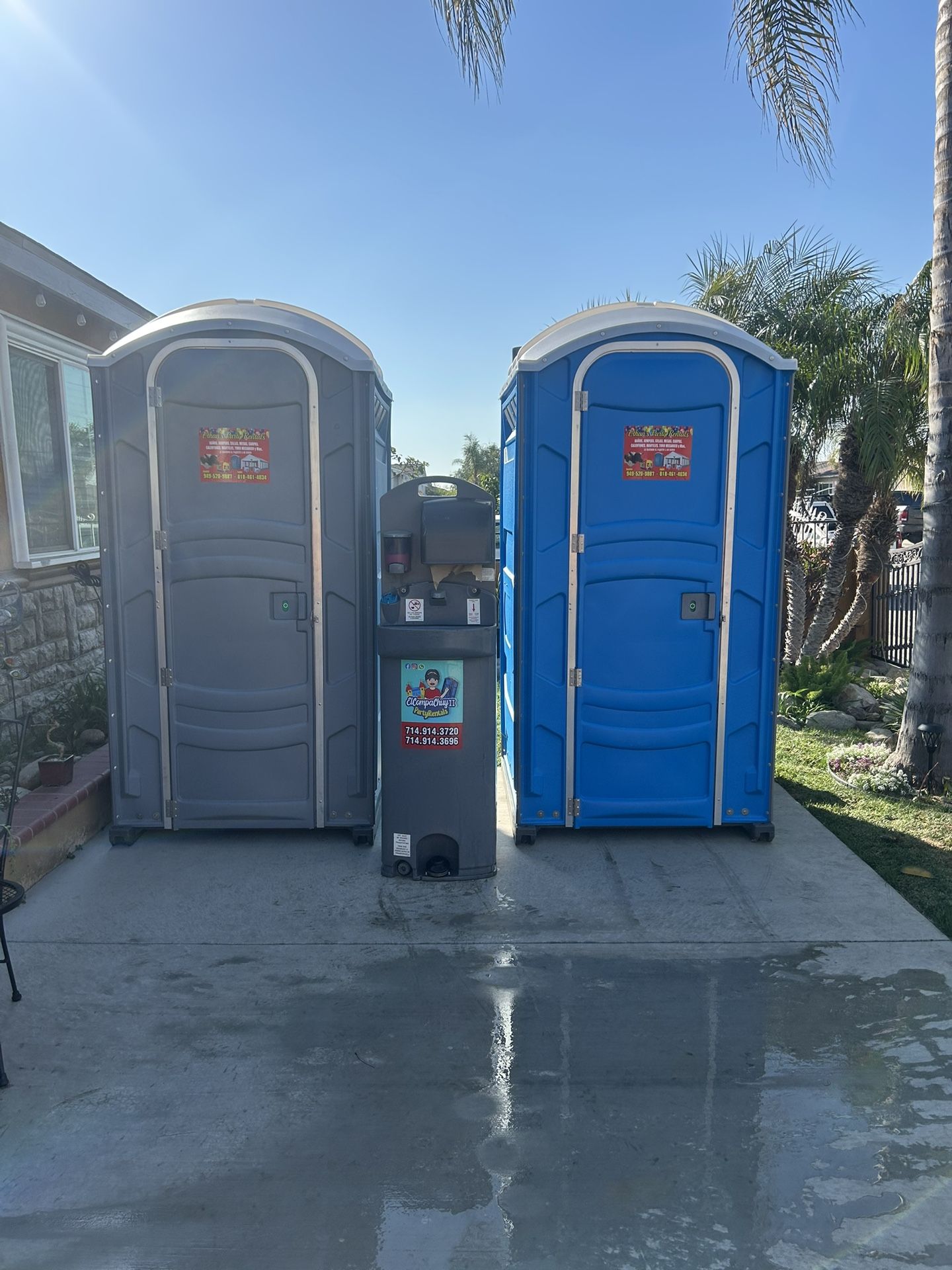 two porta potty’s and sink 
