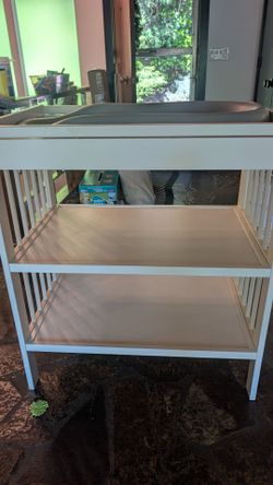 Changing table and peanut changing pad