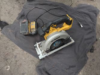 Dewalt bandsaw battery charged with the charger
