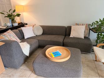 Sofa with pillows + ottoman