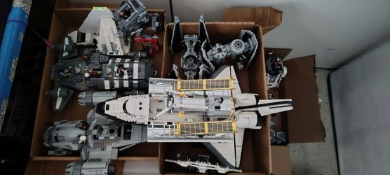 Lego sets mostly star wars everything is 100% with mini figs, boxes, and materials