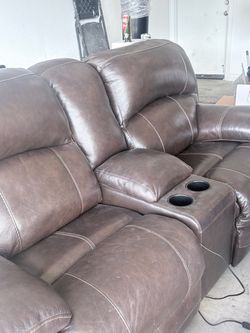 Brown Leather Reclining Loveseat with Cup Holders