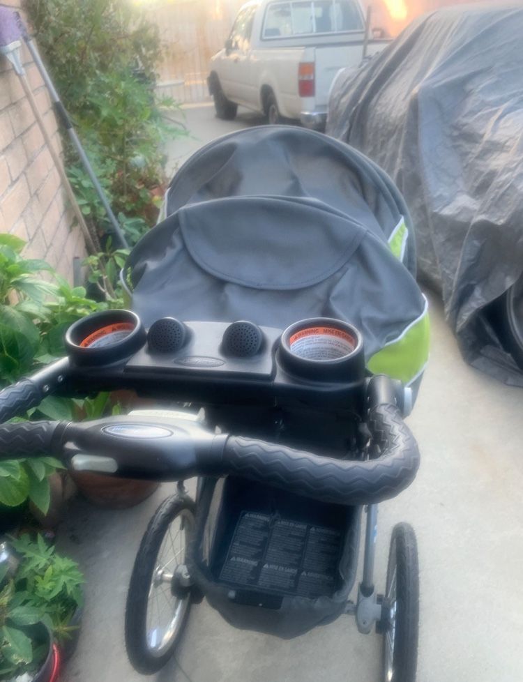 Green Baby Stroller