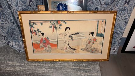 framed item is a Japanese woodblock print triptych titled Hina Matsuri Festival, created by artist Toyohara Chikanobu between 1894 and 1896.The print,