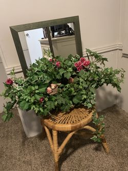 Indoor mirrored window box with artificial foliage